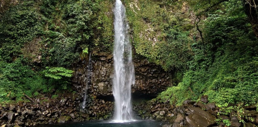 Lembah Anai Waterfall with lush forest and railway in West Sumatra